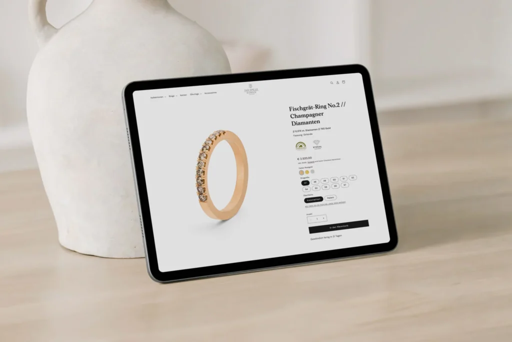 tablet mit screenshot einer produktseite mit diamantring im jan spille online shop von agentur Ooniyo shopify shop erstellen lassen